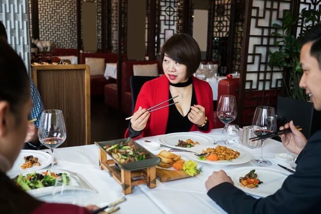 Ingredients Make the Biggest Difference in Authentic Cooking Friends enjoy an authentic Asian meal in a restaurant